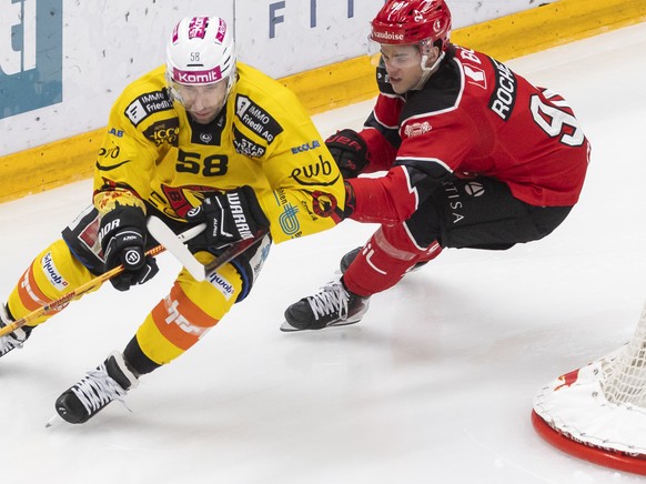 Romain Loeffel (SCB), gauche, lutte pour le puck avec Theo Rochette (LHC), droite, lors du match du championnat suisse de hockey sur glace de National League entre Lausanne HC (LHC) et SC Bern (SCB) c ...