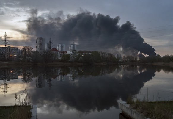 KEYPIX - epa12893411 Smoke rises over the city after a Russian missile strike in Kyiv, Ukraine, 16 April 2026, amid the Russian invasion. At least four people were killed, including one child, and 49  ...
