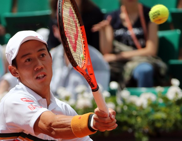 epa06011869 Kei Nishikori of Japan in action against Fernando Verdasco of Spain during their men’s singles 4th round match during the French Open tennis tournament at Roland Garros in Paris, France, 0 ...