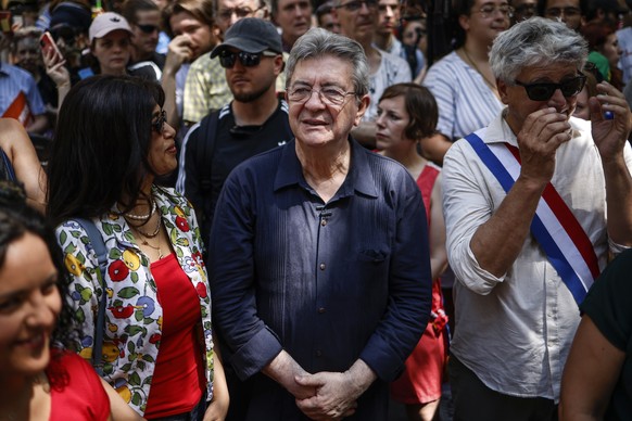 epa13054127 Leader of the far-left party La France Insoumise (LFI) Jean-Luc Melenchon (C) attends a rally against racism in Paris, France, 21 June 2026. EPA/YOAN VALAT