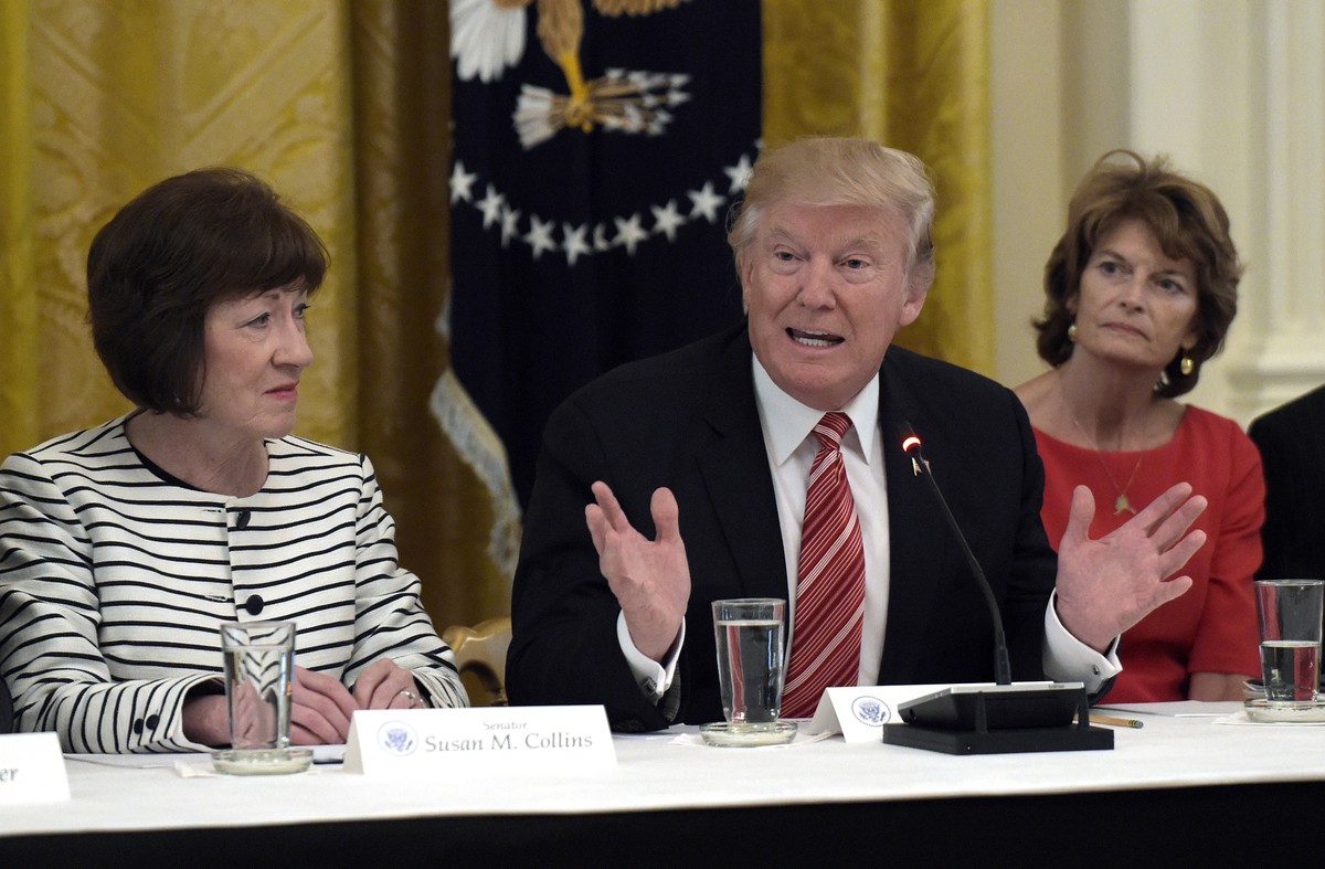 President Donald Trump, center, speaks as he meets with Republican senators on health care in the East Room of the White House in Washington, Tuesday, June 27, 2017. Sen. Susan Collins, R-Maine, left, ...