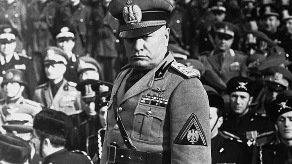 Italian Dictator Benito Mussolini when he attended the ceremony celebrating the 12 anniversary of the foundation of the Musketeers, his personal bodyguard in Rome on Feb. 17, 1943. (KEYSTONE/AP Photo)