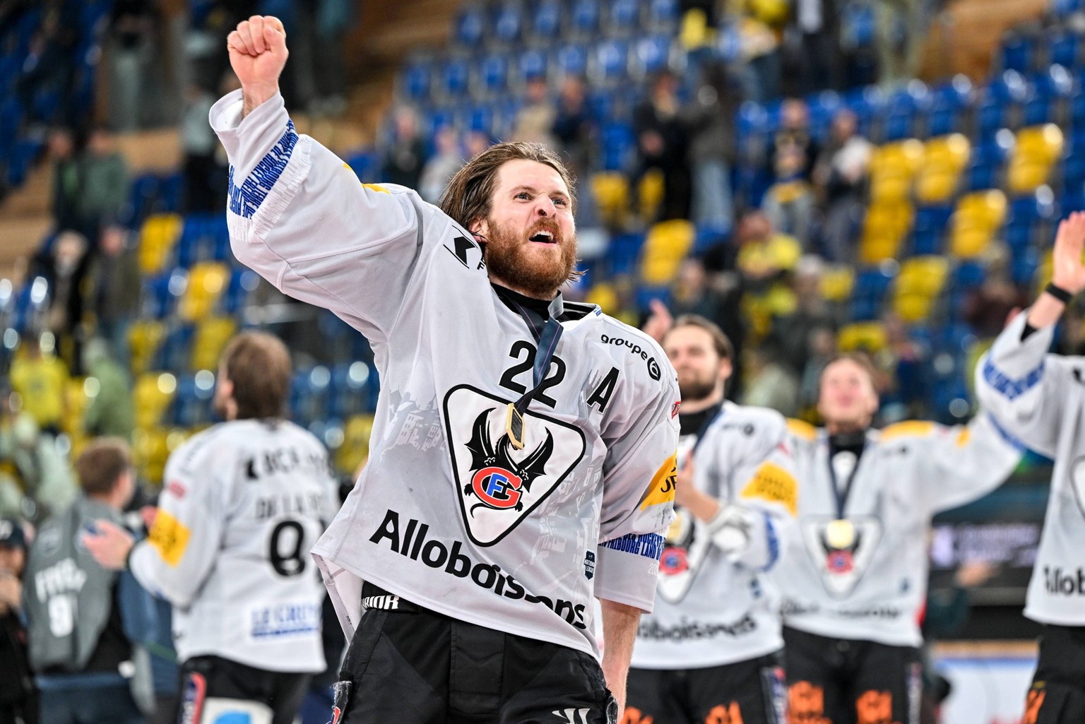 DAVOS, SWITZERLAND - APRIL 30: Christoph Bertschy of Fribourg celebrates the victory during game 7 of the National League Final between HC Davos v HC Fribourg-Gotteron on April 30, 2026 in Davos, Swit ...