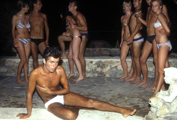 GEORGE MICHAEL OF WHAM DURING FILMING OF THE CLUB TROPICANA VIDEO. / *** HIGHER RATES APPLY ***.