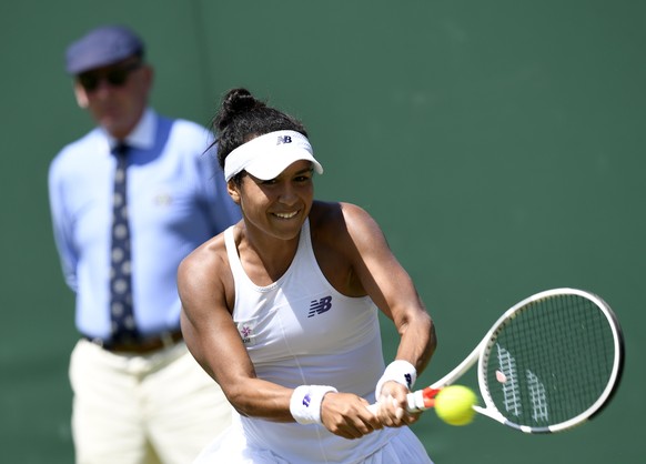 epa06067464 Heather Watson of Britain in action against Anastasija Sevastova of Latvia during their second round match for the Wimbledon Championships at the All England Lawn Tennis Club, in London, B ...