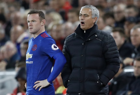 Britain Football Soccer - Liverpool v Manchester United - Premier League - Anfield - 17/10/16
Manchester United&#039;s Wayne Rooney prepares to comes on as Jose Mourinho looks on
Action Images via R ...