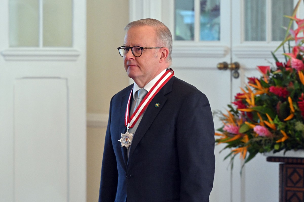 epa13090142 Australia's Prime Minister Anthony Albanese receives the Companion of the Order of Fiji before signing a treaty and an alliance at State House in Suva, Fiji, 06 July 2026. EPA/MICK TS ...