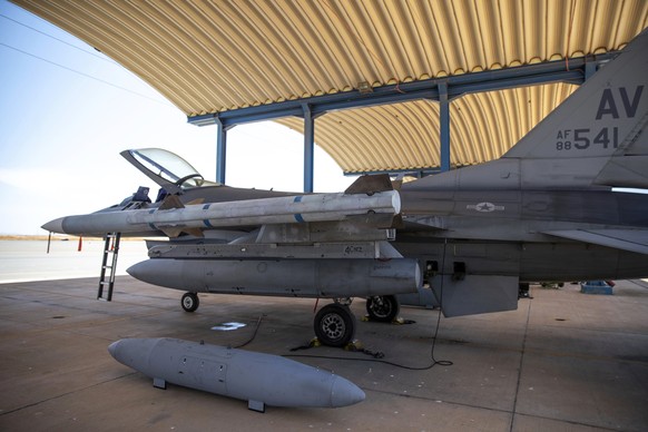 FILE - Weapons are loaded on a U.S. F-16 fighter jet as it prepares to take part in the African Lion military exercise, in Ben Guerir, Morocco, June 14, 2021. President Joe Biden on Friday, May 19, 20 ...