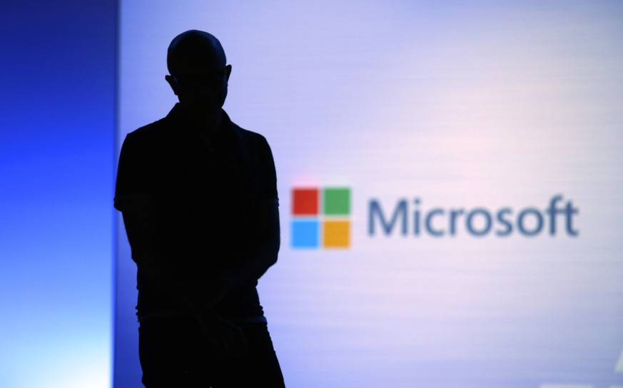 FILE- In this May 7, 2018, file photo Microsoft CEO Satya Nadella looks on during a video as he delivers the keynote address at Build, the company&#039;s annual conference for software developers in S ...