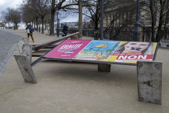 Information panels for voting are fallen be caused by storm Ciara, in the Old city of Geneva, Switzerland, Monday, February 10, 2020. Severe warnings have been issued for Western and Northern Europe a ...