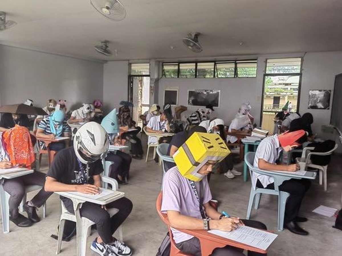 Die philippinische Lehrerin Mary Joy Mandane-Ortiz hat ihre Schülerinnen und Schüler aufgefordert, aus Papier einen Hut zu basteln, damit sie bei den Zwischenprüfungen nicht abschreiben können.