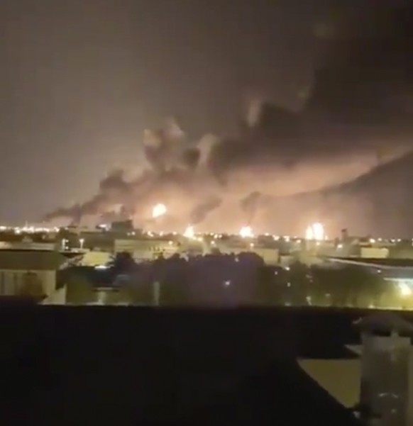 Smoke fills the sky at the Abqaiq oil processing facility on Saturday, Sept. 14, 2019 in Saudi Arabia. Drones claimed by Yemen&#039;s Houthi rebels attacked the world&#039;s largest oil processing fac ...