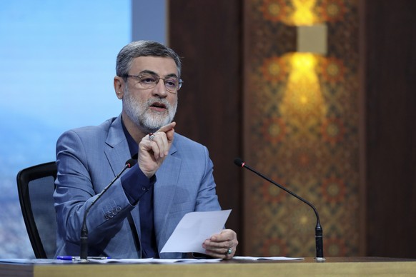 In this picture made available by Iranian state-run TV, IRIB, presidential candidate for the June 28 election Amirhossein Ghazizadeh Hashemi, Vice President of late Ebrahim Raisi, speaks in a debate o ...