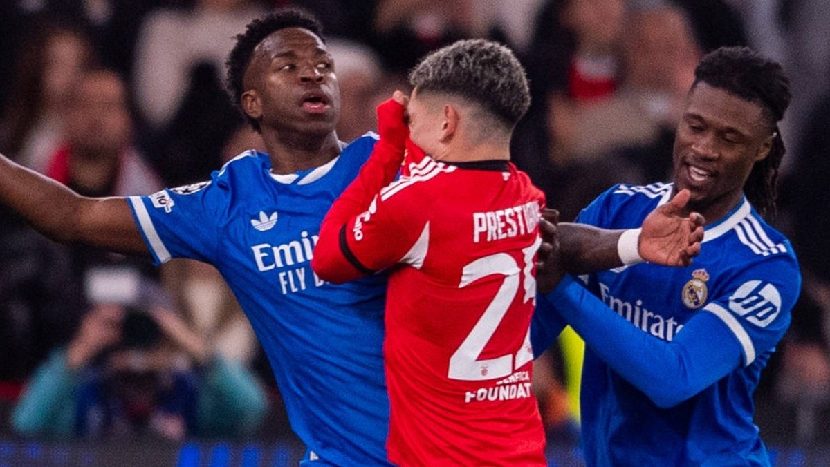 February 17, 2026, Lisbon, Lisboa, Portugal: Gianluca Prestianni of SL Benfica seems with Vinicius Junior of Real Madrid CF during the UEFA Champions League 2025/26 League Knockout Play-off First Leg  ...