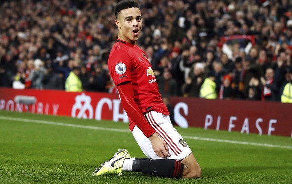 Manchester United's Mason Greenwood celebrates scoring his side's second goal of the game during their English Premier League soccer match against Newcastle United at Old Trafford, Mancheste ...