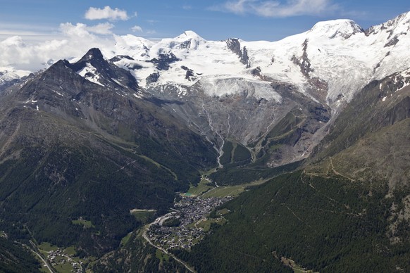 Aerial view of the Feegletscher glacier, the Allalin mountain and the town of Saas Fee, Switzerland, pictured Monday, July 4, 2011. (KEYSTONE/Alessandro Della Bella)