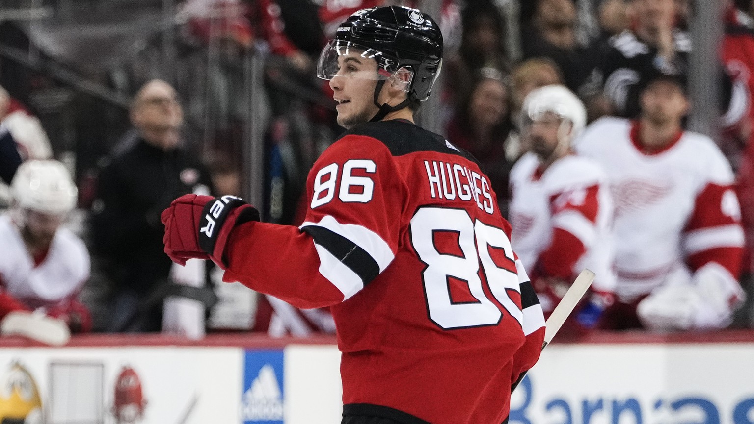 New Jersey Devils&#039; Jack Hughes (86) celebrates a goal against the Detroit Red Wings during the second period of an NHL hockey game Thursday, Oct. 12, 2023, in Newark, N.J. (AP Photo/Frank Frankli ...
