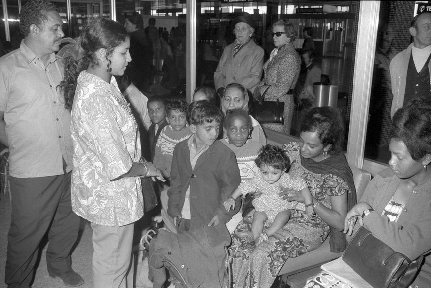 Refugees from Uganda arrive at Zurich-Kloten airport, 1972 (Photo by Blick/RDB/ullstein bild via Getty Images)
