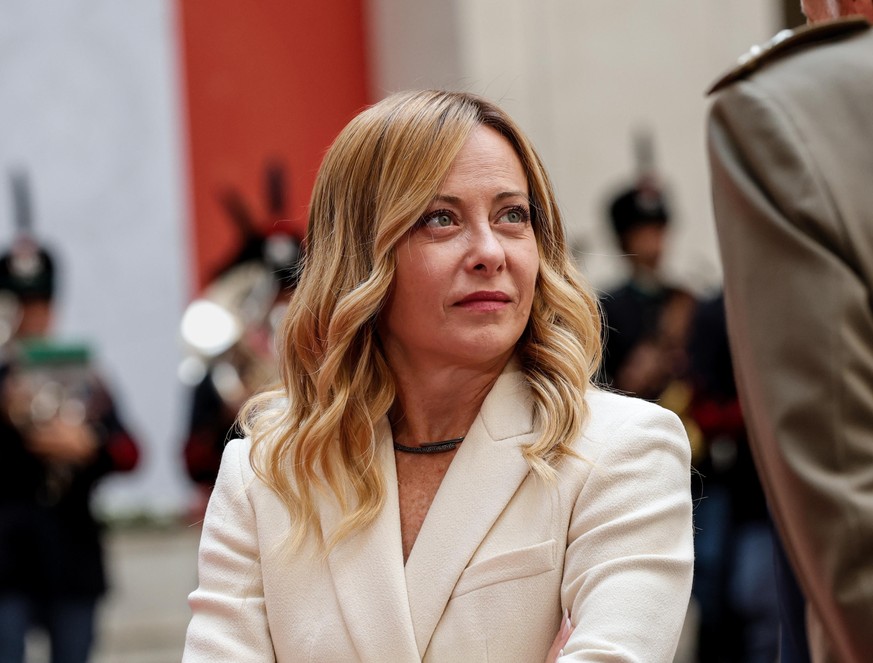 epa13282981 Italy's Prime Minister Giorgia Meloni looks on as she waits to welcome Slovenian Prime Minister Janez Jansa (not pictured) before their meeting at the Chigi Palace in Rome, Italy, 05  ...
