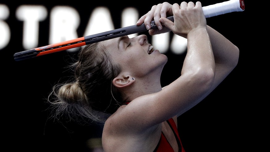 Romania&#039;s Simona Halep celebrates after defeating Germany&#039;s Angelique Kerber in their semifinal at the Australian Open tennis championships in Melbourne, Australia, Thursday, Jan. 25, 2018.  ...