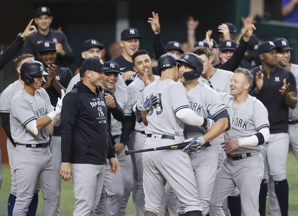 Sport Bilder des Tages New York Yankees Aaron Judge celebrates with Giancarlo Stanton and teammates after he hits his 62nd home run of the season in the first inning breaking the American League recor ...