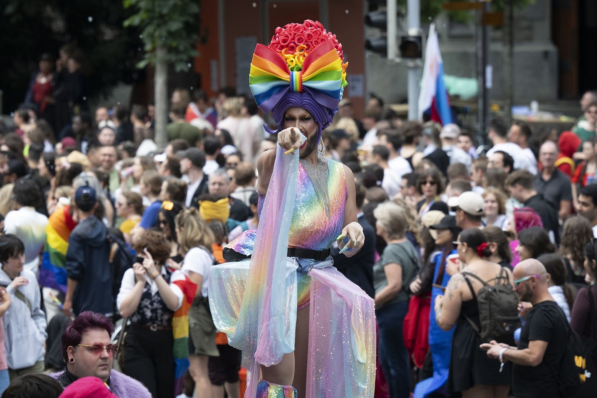 People take part in the Zurich Pride parade in Zurich, Switzerland, on Saturday, June 14, 2024. (KEYSTONE/Christian Beutler)