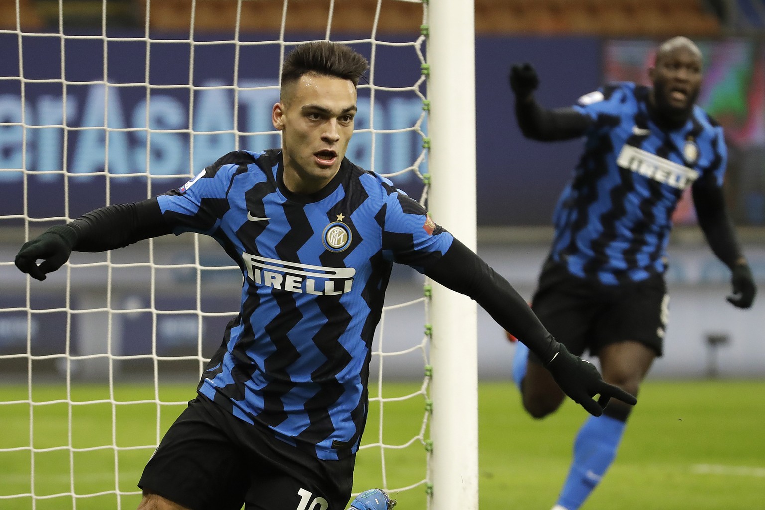 Inter Milan&#039;s Lautaro Martinez celebrates his goal against Lazio during a Serie A soccer match between Inter Milan and Lazio at the San Siro stadium in Milan, Italy, Sunday, Feb. 14, 2021. (AP Ph ...