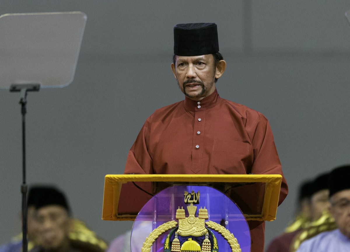 epa07481909 Sultan of Brunei Hassanal Bolkiah speaks at the International Convention Centre to celebrate the Islamic event Isra Mi'raj, in Bandar Seri Begawan, Brunei, 03 April 2019. The Sultanat ...