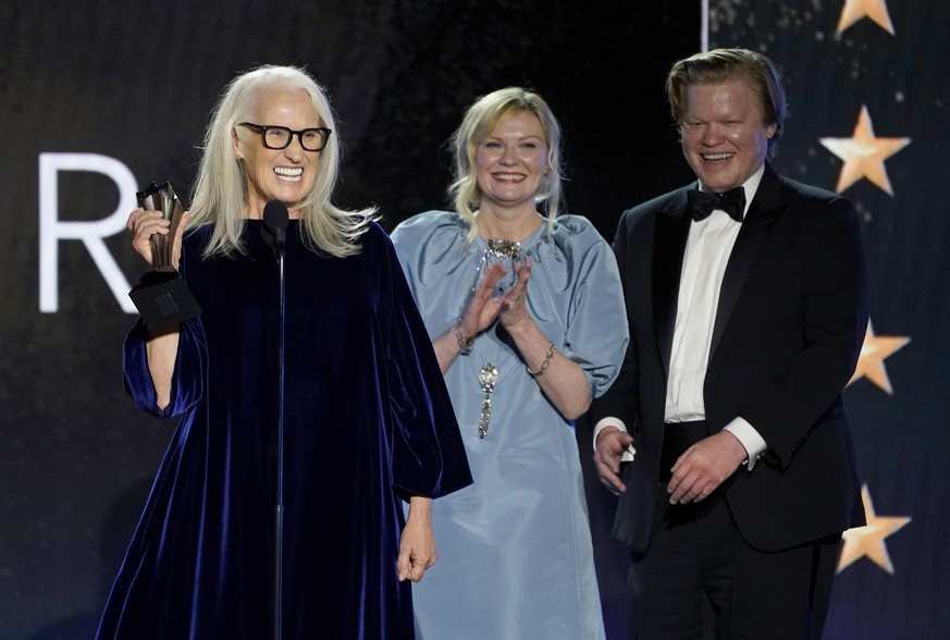Jane Campion, from left, Kristen Dunst, and Jesse Plemons accept the award for best picture award for &quot;The Power of the Dog&quot; at the 27th annual Critics Choice Awards on Sunday, March 13, 202 ...