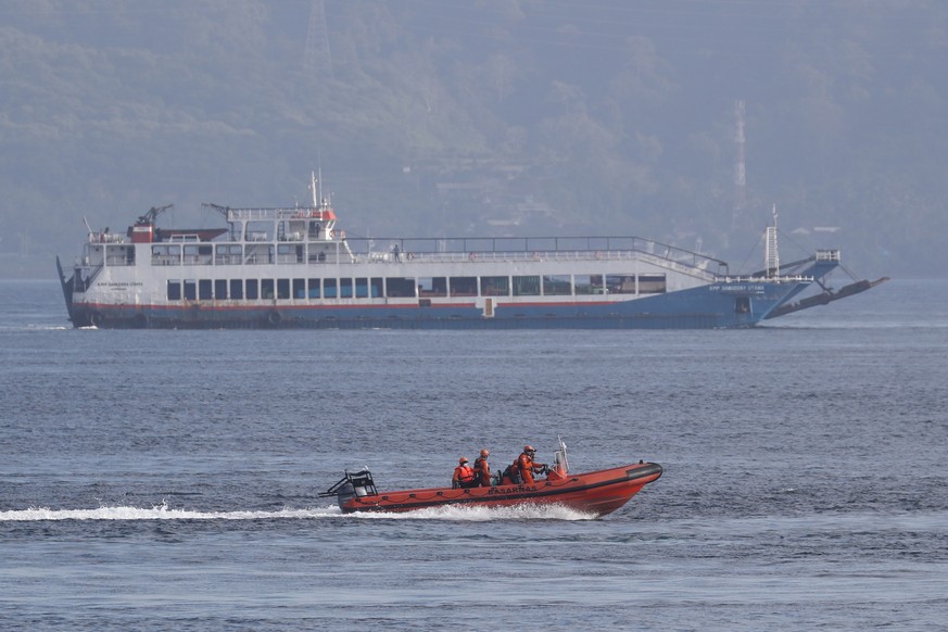 epa09312497 Search operations following the sinking of a ferry in Gilimanuk Port, Bali, Indonesia, 30 June 2021. At least seven passengers died when the KMP Yunicee ferry carrying more than 50 people  ...