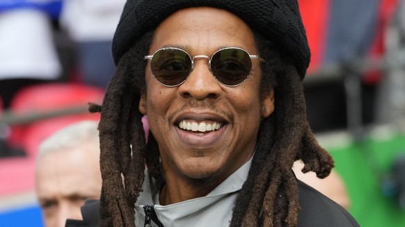 FILE - Jay-Z smiles ahead of the Champions League final soccer match between Borussia Dortmund and Real Madrid at Wembley stadium in London, June 1, 2024. (AP Photo/Kirsty Wigglesworth, File)