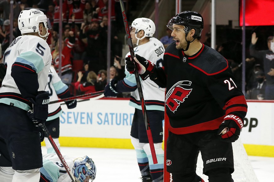 Carolina Hurricanes&#039; Nino Niederreiter (21) celebrates his goal against the Seattle Kraken during the second period of an NHL hockey game in Raleigh, N.C., Sunday, March 6, 2022. (AP Photo/Karl B ...