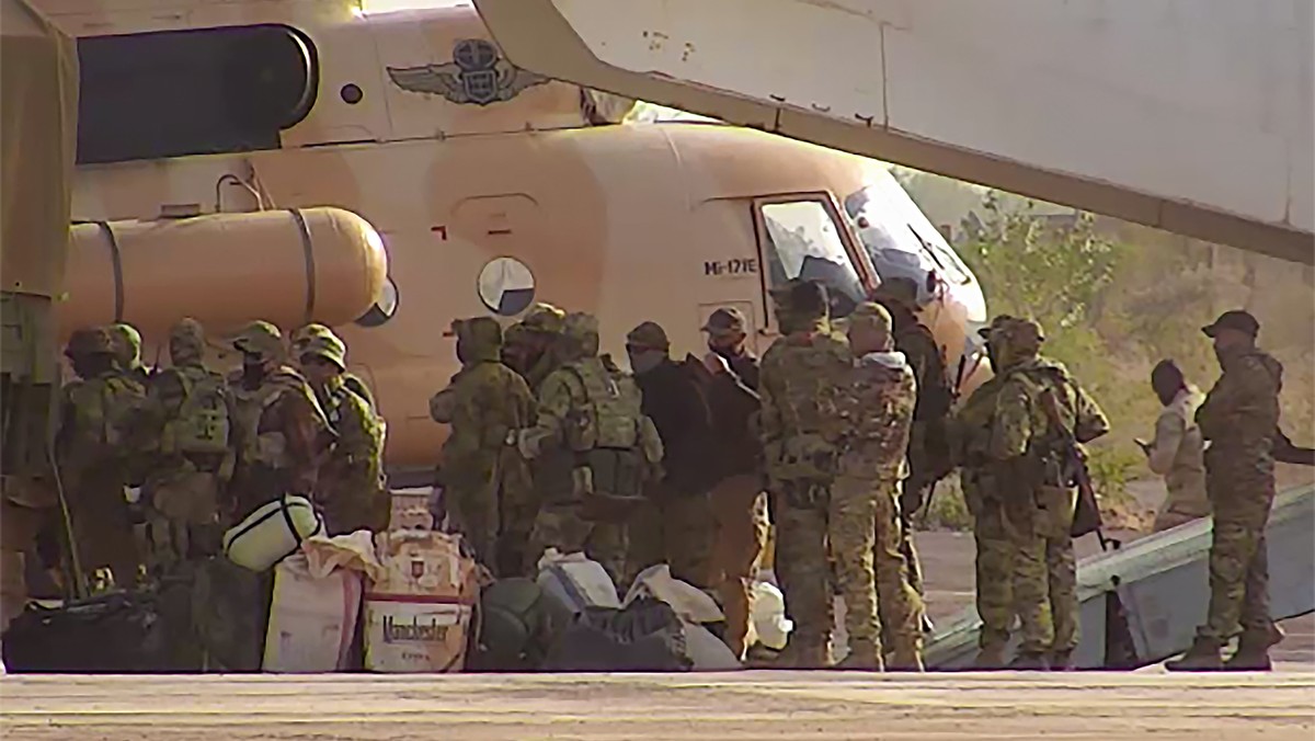 FILE - This undated photograph handed out by French military shows Russian mercenaries boarding a helicopter in northern Mali. Russia's Wagner Group, a private military company led by Yevgeny Pri ...