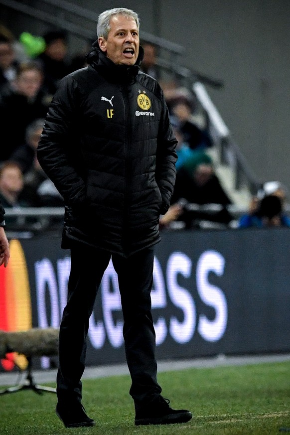 epa07367852 Dortmund&#039;s head coach Lucien Favre reacts during the UEFA Champions League round of 16 soccer match between Tottenham Hotspur and Borussia Dortmund at Wembley Stadium, Britain, 13 Feb ...