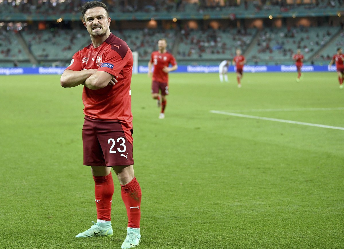 Switzerland's Xherdan Shaqiri celebrates scoring his side's third goal during the Euro 2020 soccer championship group A match between Switzerland and Turkey at the Baku Olympic Stadium in Ba ...
