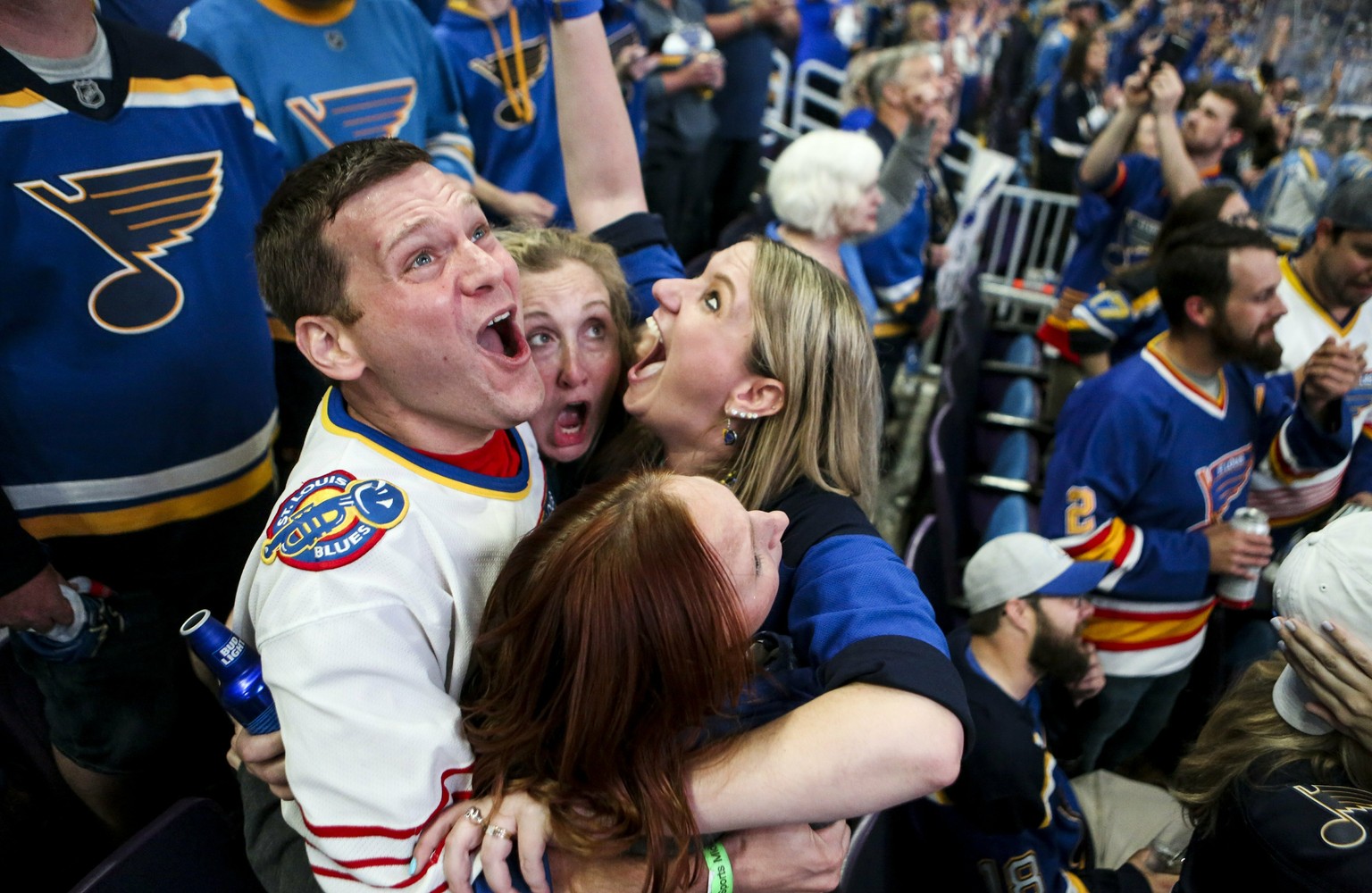 Bill Kess, left, and his friends react as the clock hits zero and the St. Louis Blues win the Stanley Cup over the Boston Bruins in Boston, during a watch party Wednesday, June 12, 2019, at Enterprise ...
