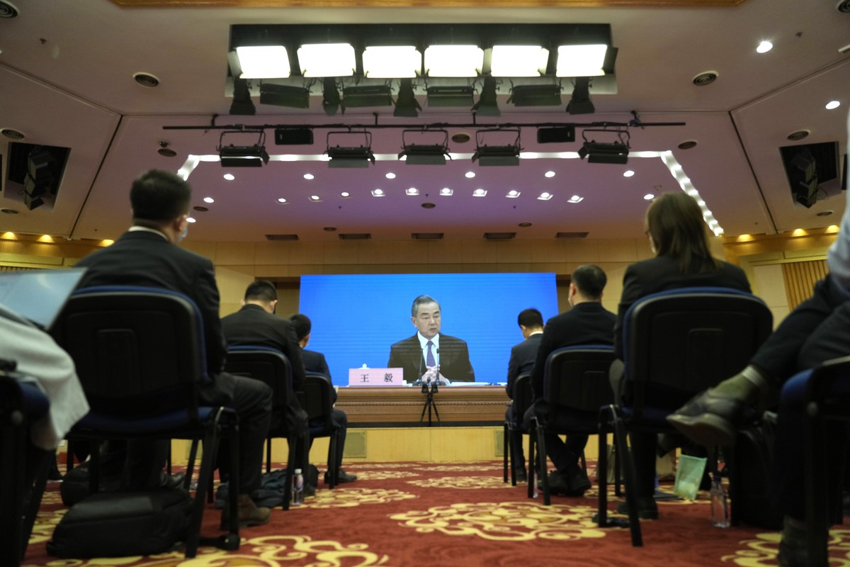 Chinese Foreign Minister Wang Yi speaks during a remote video press conference held on the sidelines of the annual meeting of China's National People's Congress (NPC) in Beijing, Monday, Mar ...
