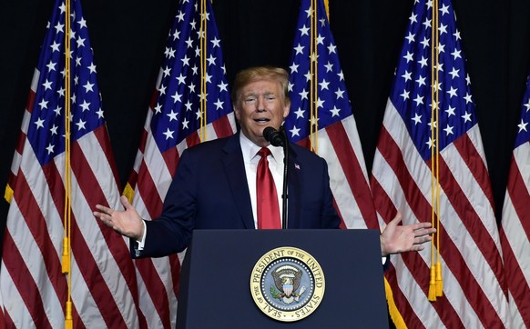 President Donald Trump speaks during a fundraiser in Sioux Falls, S.D., Friday, Sept. 7, 2018. Trump is speaking at the Noem-Rhoden Victory Committee, a joint fundraising committee authorized by and c ...