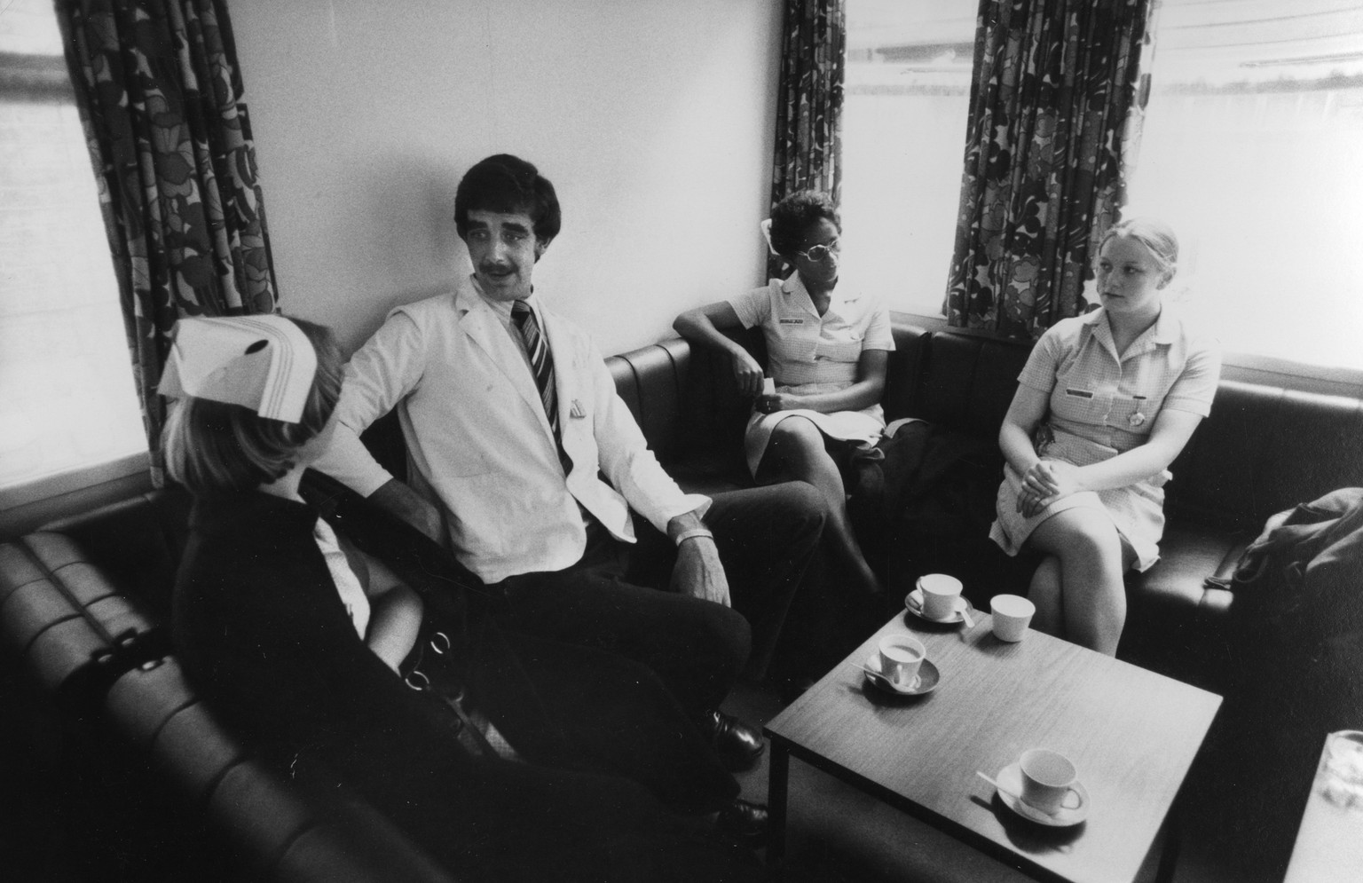 Peter Mayhew At Work
English actor Peter Mayhew (1944 - 2019), with nurses during a tea break at King's College Hospital, London, where he works as an orderly, 22nd August 1977. Mayhew, who is 7 ...