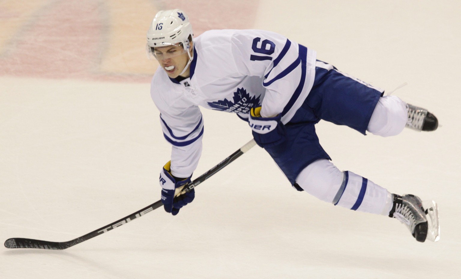 Toronto Maple Leafs&#039; Mitch Marner goes flying after making contact with another player, in an NHL rookie tournament game against the Montreal Canadiens in London, Ontario, on Saturday, Sept. 17,  ...