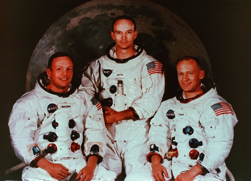 Die Crew des Raumschiffs Apollo 11: Von links sind zu sehen Kommandant Neil Armstrong, Pilot Michael Collins, und Astronaut Edwin Eugene Aldrin (Buzz Aldrin).