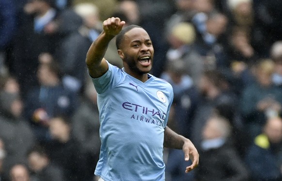 Manchester City's Raheem Sterling celebrates after scoring his side's first goal during the English Premier League soccer match between Manchester City and Aston Villa at Etihad stadium in M ...