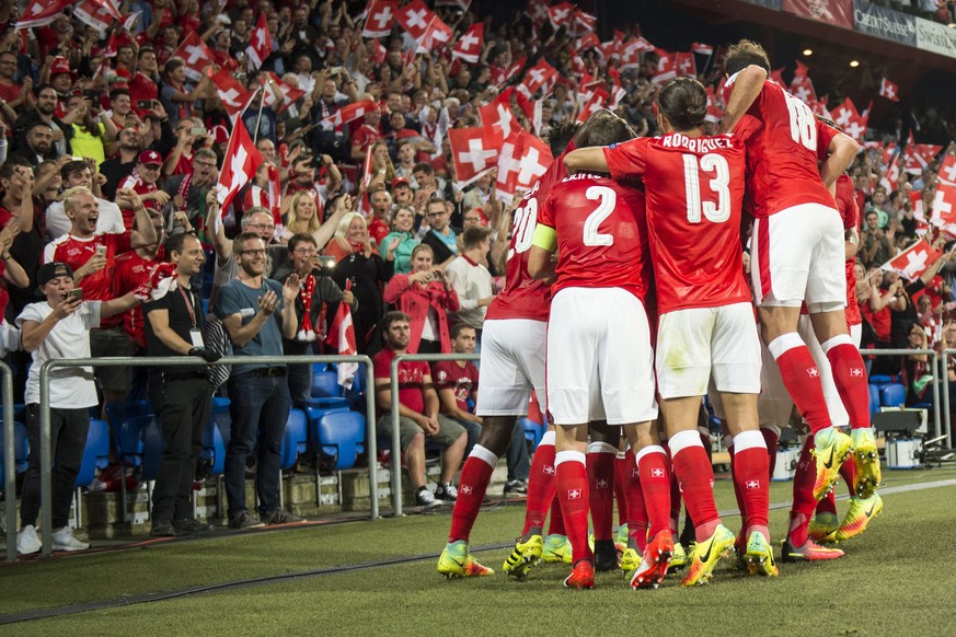 Swiss player celebrate Embolo&#039;s goal during the 2018 Fifa World Cup Russia group B qualification soccer match between Switzerland and Portugal at the St. Jakob-Park stadium, in Basel, Switzerland ...