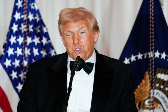 President Donald Trump speaks at a Kennedy Center Honors reception for recipients Sylvester Stallone, George Strait, Kiss, Gloria Gaynor and Michael Crawford at the State Department, Saturday, Dec. 6, ...