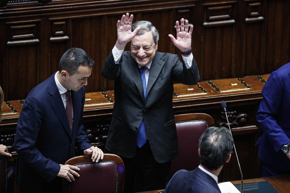 Italian Premier Mario Draghi waves after delivering his address at the Parliament in Rome, Thursday, July 21, 2022. Premier Mario Draghi's national unity government headed for collapse Thursday after  ...