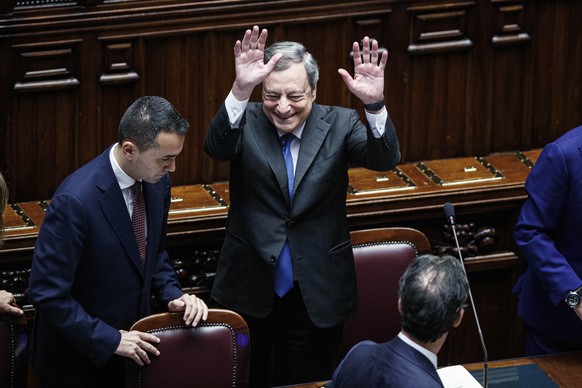 Italian Premier Mario Draghi waves after delivering his address at the Parliament in Rome, Thursday, July 21, 2022. Premier Mario Draghi&#039;s national unity government headed for collapse Thursday a ...