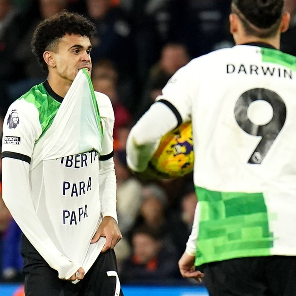 Luton Town v Liverpool - Premier League - Kenilworth Road Liverpool s Luis Diaz left celebrates scoring their side s first goal of the game by unveiling a shirt that reads translated to English Freedo ...