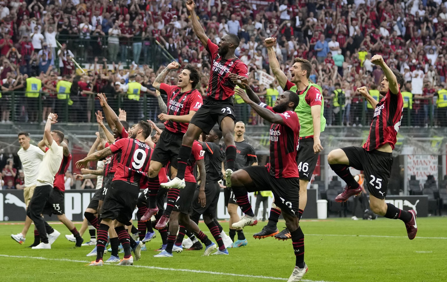 AC Milan players celebrate at the end of the Serie A soccer match between AC Milan and Atalanta at the San Siro stadium, in Milan, Italy, Sunday, May 15, 2022. Milan won 2-0. (AP Photo/Antonio Calanni ...