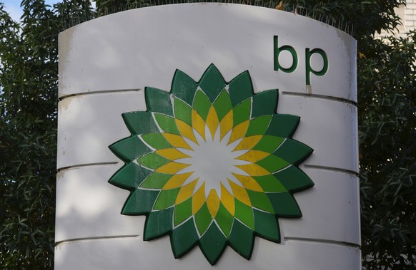 FILE - A logo of BP is seen at a gas station in London, on Nov. 1, 2022. British energy company BP reported record annual earnings on Tuesday, Feb. 7, 2023 amid growing calls for the U.K. government t ...