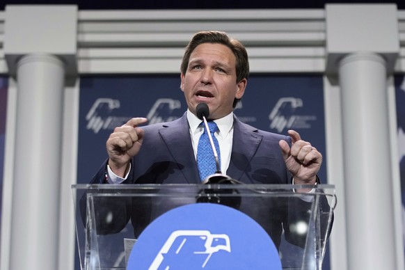 FILE - Florida Governor Ron DeSantis speaks at an annual leadership meeting of the Republican Jewish Coalition on November 19, 2022 in Las Vegas.  A Florida prosecutor suspended by DeSantis opened his federal…